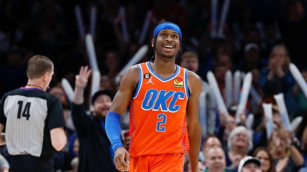 Thunder guard Shai Gilgeous-Alexander smiles after a play.